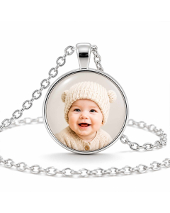 Custom baby photo pendant with silver-tone chain on white background