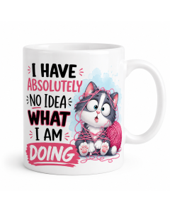 Funny cat mug with “I Have Absolutely No Idea What I Am Doing” quote and cute kitten tangled in bright pink yarn.