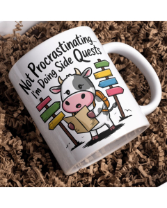 Funny cow side quests mug displayed in gift box filler