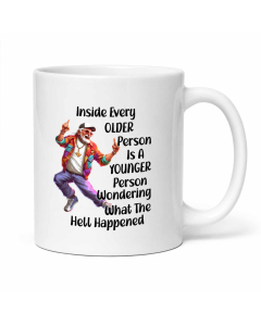 Funny older person coffee mug with What The Hell Happened quote and colourful dancing older man design