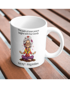 Not My Fucking Problem novelty mug on wooden table